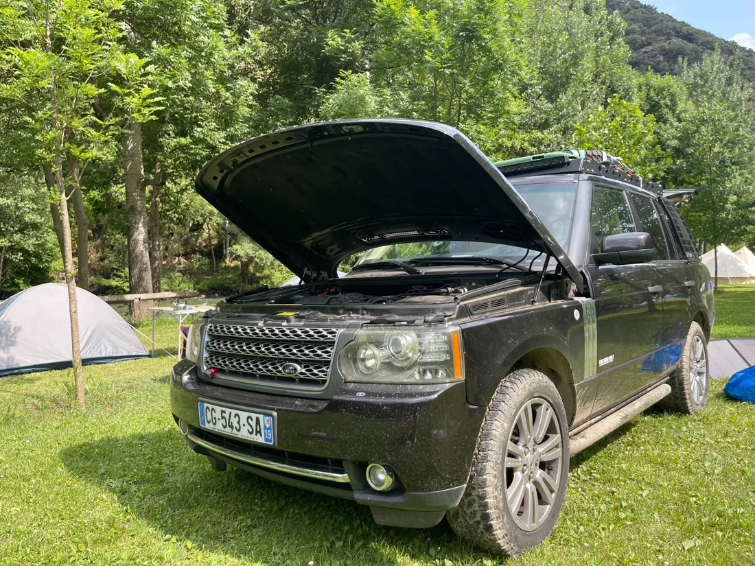 Ben's Range Rover with its bonnet open during a workshop job